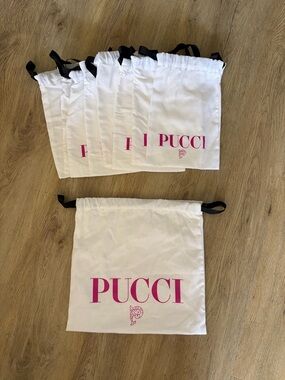 Pucci White Drawstring Dust Bags with Pink Logo 8 small bags and I large bag.